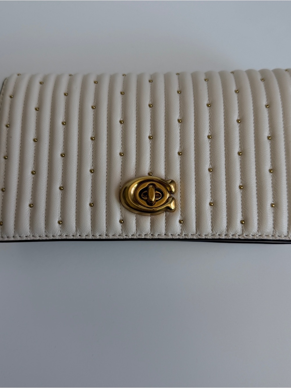 Coach Cream Quilted Clutch with Gold Studs and Turnlock